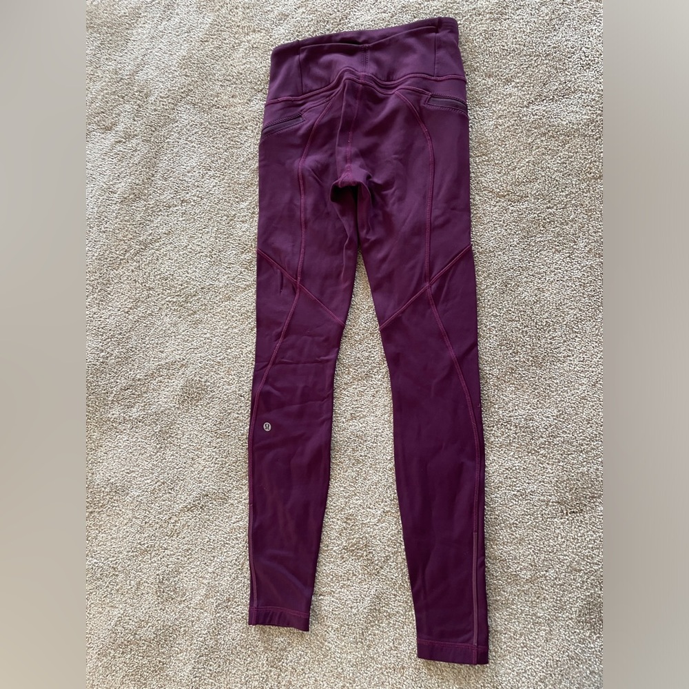 Lululemon Sz 4, plum colored running tights